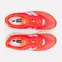 Tênis Feminino New Balance Rebel V5 Coral Neon